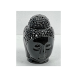 Black ceramic Buddha aromatherapy diffuser for essential oils, meditation spaces, hotels, Airbnb properties, furnished apartments, spas, and contemporary interiors.