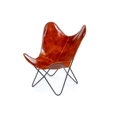 Brown genuine buffalo leather butterfly lounge chair with a durable iron frame for hotels, Airbnb properties, furnished apartments, lounges, and contemporary interiors.