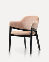Modern solid ash wood dining chair with a black wood frame, upholstered fabric seat, and ergonomic backrest for hotels, Airbnb properties, furnished apartments, restaurants, cafés, offices, and contemporary living spaces.