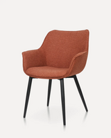Modern curved back upholstered dining chair with premium fabric seating and powder-coated metal legs for hotels, Airbnb properties, furnished apartments, restaurants, cafés, and contemporary dining spaces.