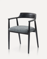 Modern solid ash wood armchair with integrated armrests, upholstered fabric seat, and minimalist Scandinavian design for hotels, Airbnb properties, furnished apartments, restaurants, cafés, offices, and contemporary living spaces.