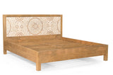 White patina carved floral detail on the Goa bed