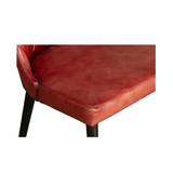 Modern dining chair with genuine leather upholstery and durable iron legs for hotels, Airbnb properties, furnished apartments, restaurants, cafés, and contemporary dining spaces.