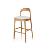 Modern Ash Wood Bar Chair handcrafted from premium solid ash wood, featuring a curved backrest, upholstered seat cushion, natural wood grain, and timeless contemporary craftsmanship.