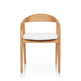 Modern Ash Wood Dining Chair handcrafted from premium solid ash wood, featuring a curved backrest, upholstered seat cushion, natural wood grain, and timeless contemporary craftsmanship.