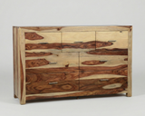 A wooden dresser with six drawers, featuring a natural wood grain pattern with alternating light beige and dark brown wood inlays, and small silver metal handles.