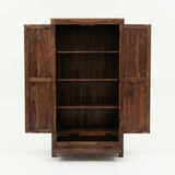 Zen Solid Sheesham Wood Wardrobe featuring two paneled doors, adjustable shelves, a spacious bottom drawer, and a rich brown finish.