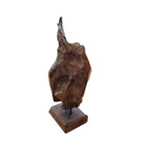 Handcrafted teak root sculpture on a display stand available in two sizes for hotels, Airbnb properties, furnished apartments, offices, and contemporary rustic interiors.