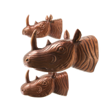 Bronze-finish aluminum rhinoceros horn wall sculpture for hotels, Airbnb properties, furnished apartments, offices, and contemporary interiors.