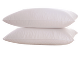 Standard white bed pillow with soft supportive filling, designed for hotels, Airbnb properties, furnished apartments, and vacation rentals for a comfortable night's sleep.