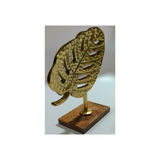 Gold aluminum leaf sculpture on a natural wooden base for hotels, Airbnb properties, furnished apartments, offices, shelves, and contemporary interiors.