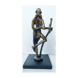 Handcrafted brass decorative table sculpture for hotels, Airbnb properties, furnished apartments, offices, shelves, and contemporary luxury interiors.