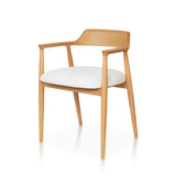Modern Ash Wood Armchair handcrafted from premium solid ash wood, featuring a curved backrest, off-white bouclé upholstered seat, natural wood grain, and timeless contemporary craftsmanship.