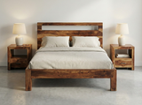 Solid Sheesham Wood Bed featuring a slatted platform design, sturdy frame, and natural wood construction. 