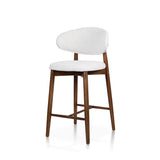 Upholstered Ash Wood Bar Chair handcrafted from premium solid ash wood, featuring a curved upholstered backrest, upholstered seat, tapered wooden legs, natural wood grain, and timeless contemporary craftsmanship.