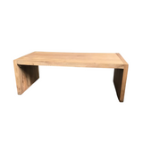 Handcrafted solid mango wood coffee table with a natural finish for hotels, Airbnb properties, furnished apartments, living rooms, and rustic contemporary interiors.