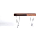 Industrial study desk with solid Sheesham wood, powder-coated steel frame, storage drawer, and open shelf for hotels, Airbnb properties, furnished apartments, and contemporary home offices.