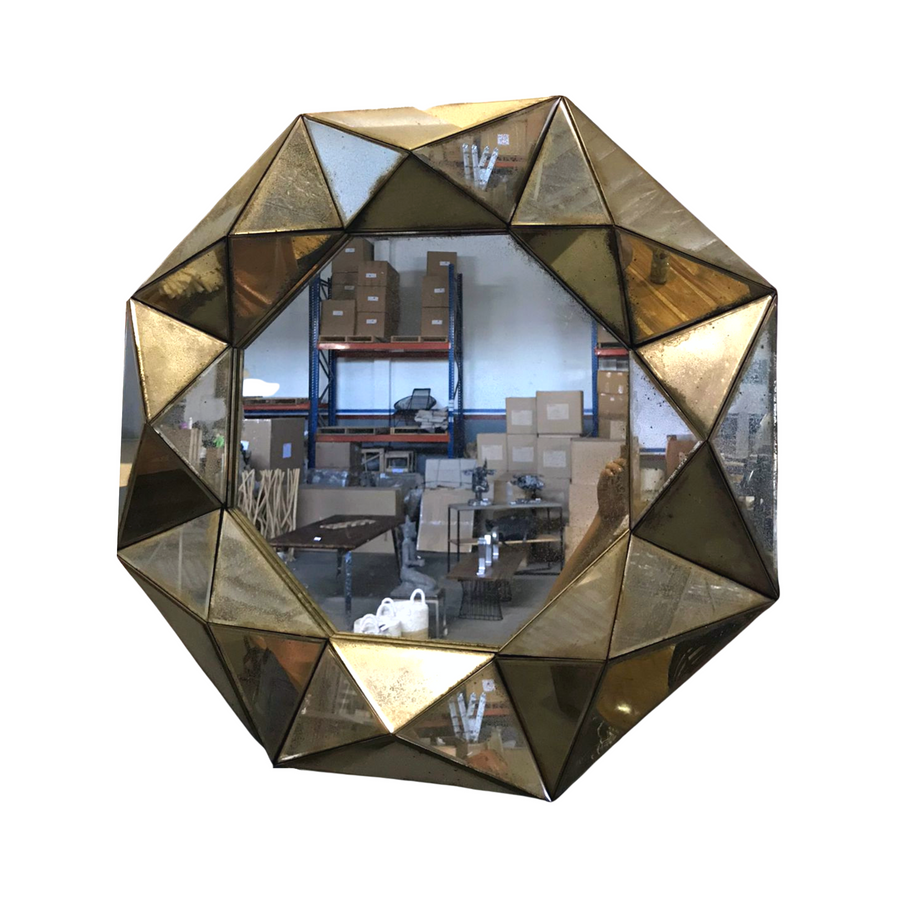 Octagonal antique wall mirror with a vintage distressed frame for hotels, Airbnb properties, furnished apartments, bedrooms, entryways, and contemporary interiors.