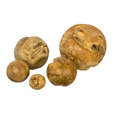Handcrafted solid teak decorative ball available in five sizes for hotels, Airbnb properties, furnished apartments, luxury interiors, and contemporary home décor.
