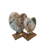 Handcrafted teak root double heart sculpture on a stand available in three sizes for hotels, Airbnb properties, furnished apartments, offices, and contemporary organic interiors.